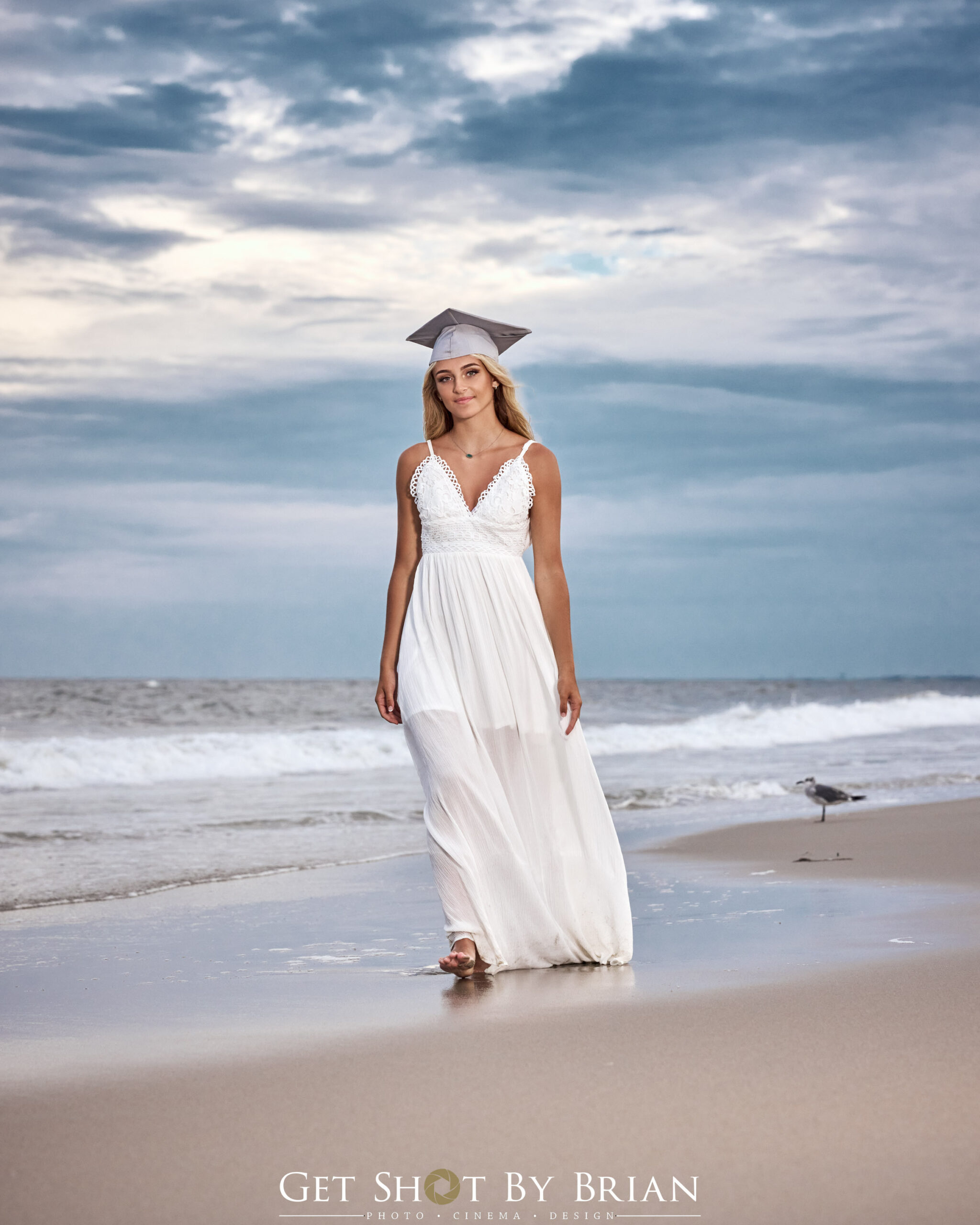 high school senior picture of a girl on the beach